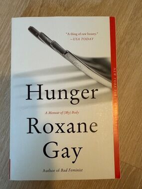 Hunger by Roxane Gay — White & Red Paperback